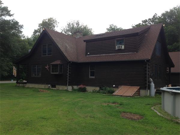 4 Woodlawn Road Freetown, MA 02702 - Photo 27 of 30 a front view of a house with a yard