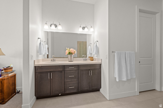 531 North Legend Way West, Unit D Mapleton, UT 84664 - Photo 19 of 42 Bathroom with double vanity, light tile patterned flooring, and walk in shower