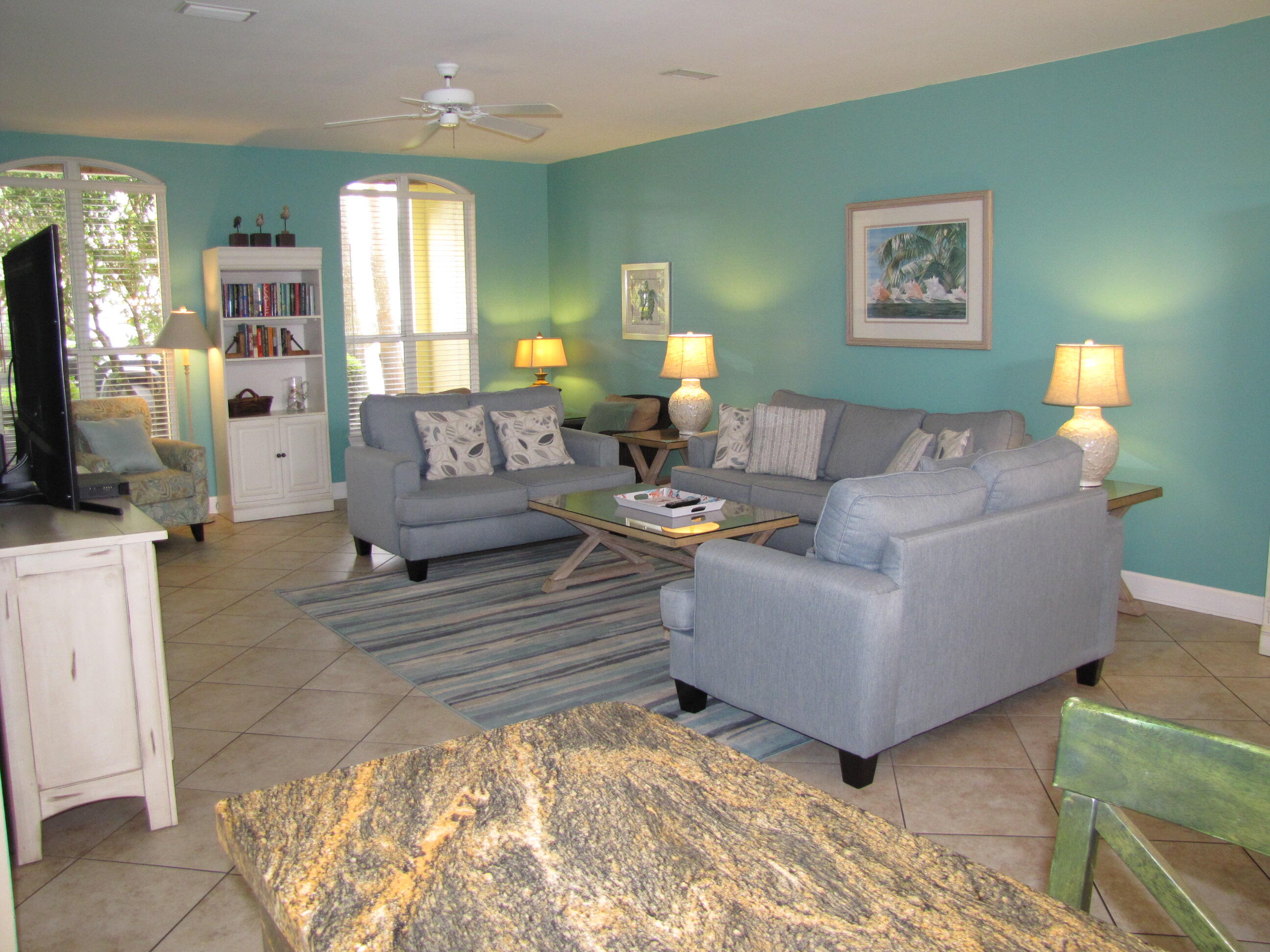 22 Amber Cove Miramar Beach, FL 32550 - Photo 16 of 60 a living room with furniture and a flat screen tv
