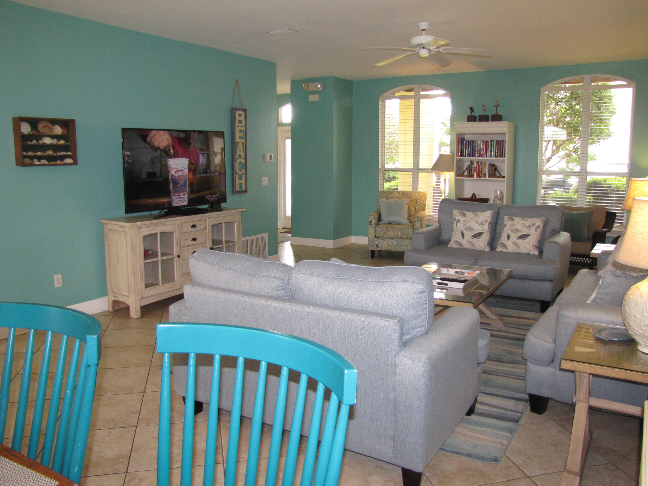 22 Amber Cove Miramar Beach, FL 32550 - Photo 17 of 60 a living room with furniture and a flat screen tv