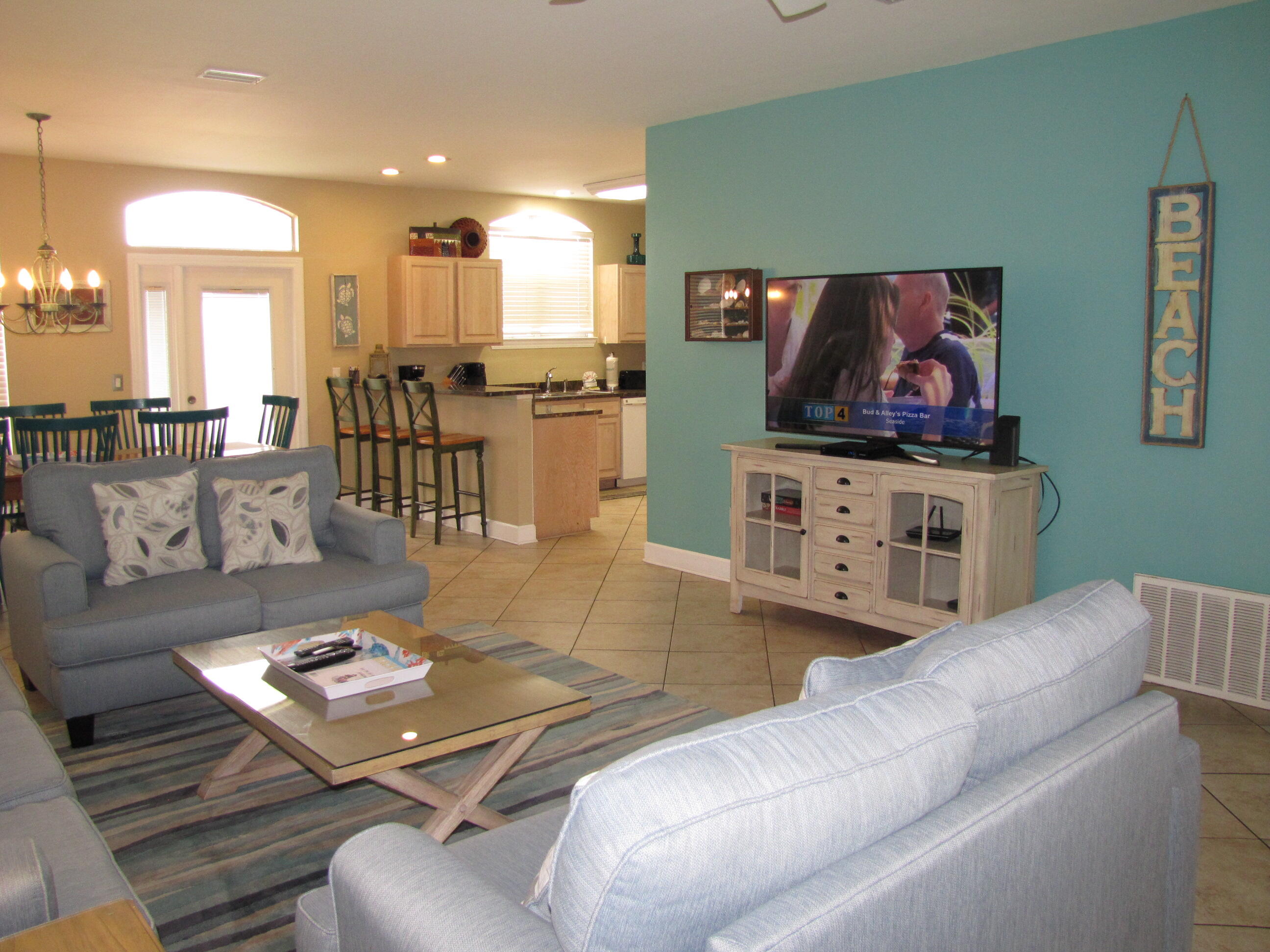 22 Amber Cove Miramar Beach, FL 32550 - Photo 20 of 60 a living room with furniture and a flat screen tv