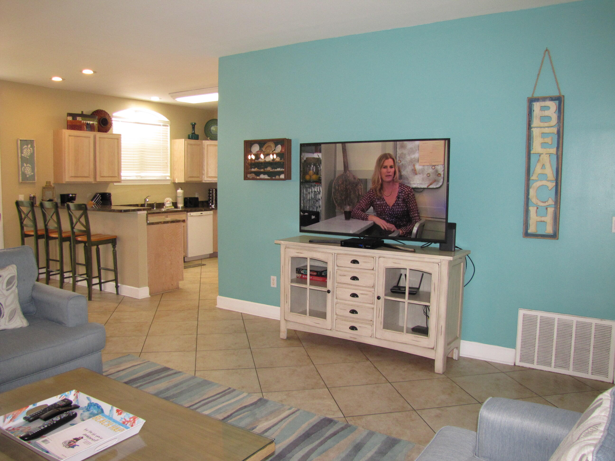 22 Amber Cove Miramar Beach, FL 32550 - Photo 21 of 60 a kitchen with stainless steel appliances kitchen island granite countertop a table and chair