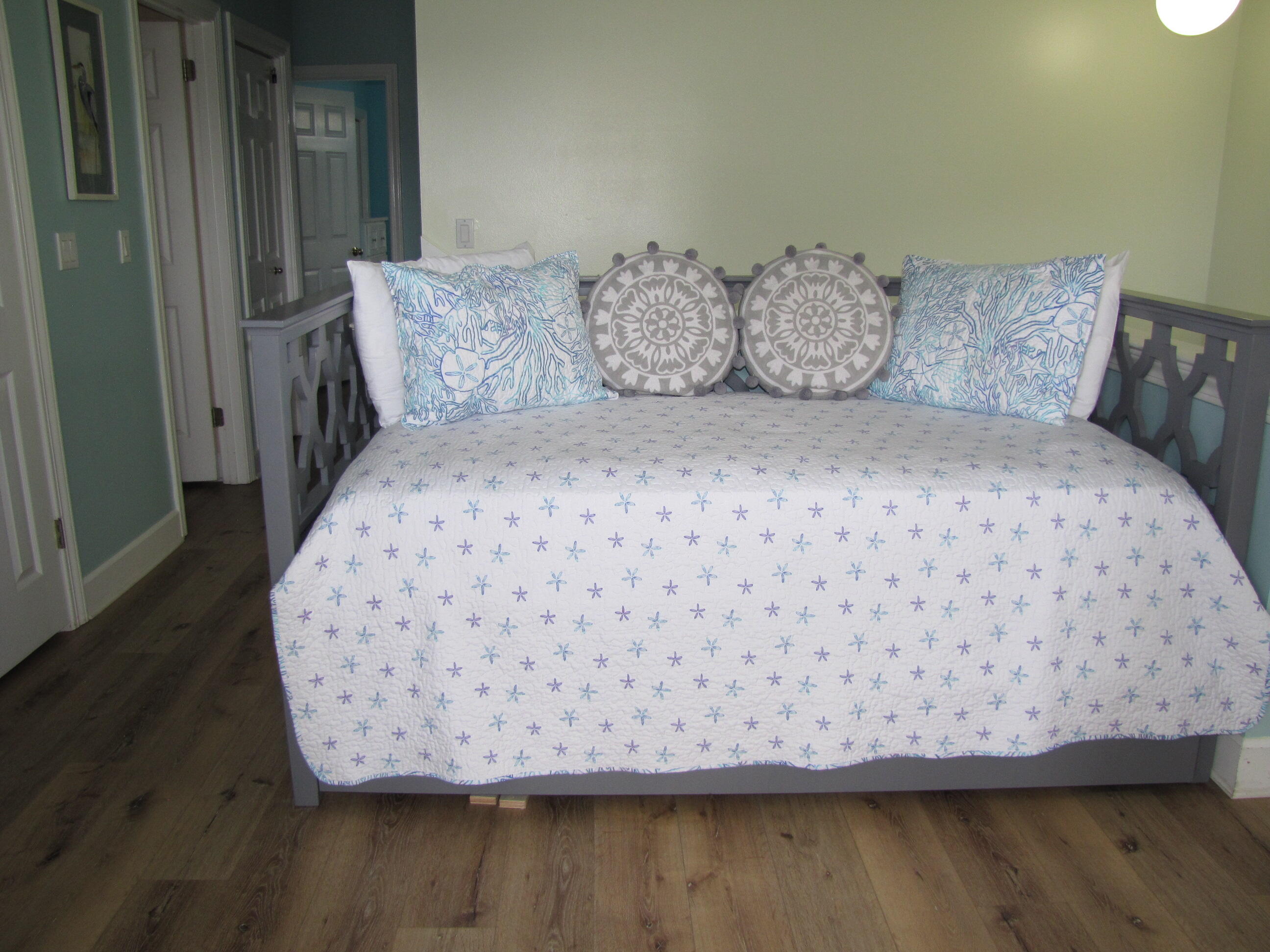 22 Amber Cove Miramar Beach, FL 32550 - Photo 24 of 60 a bedroom with a bed and wooden floor