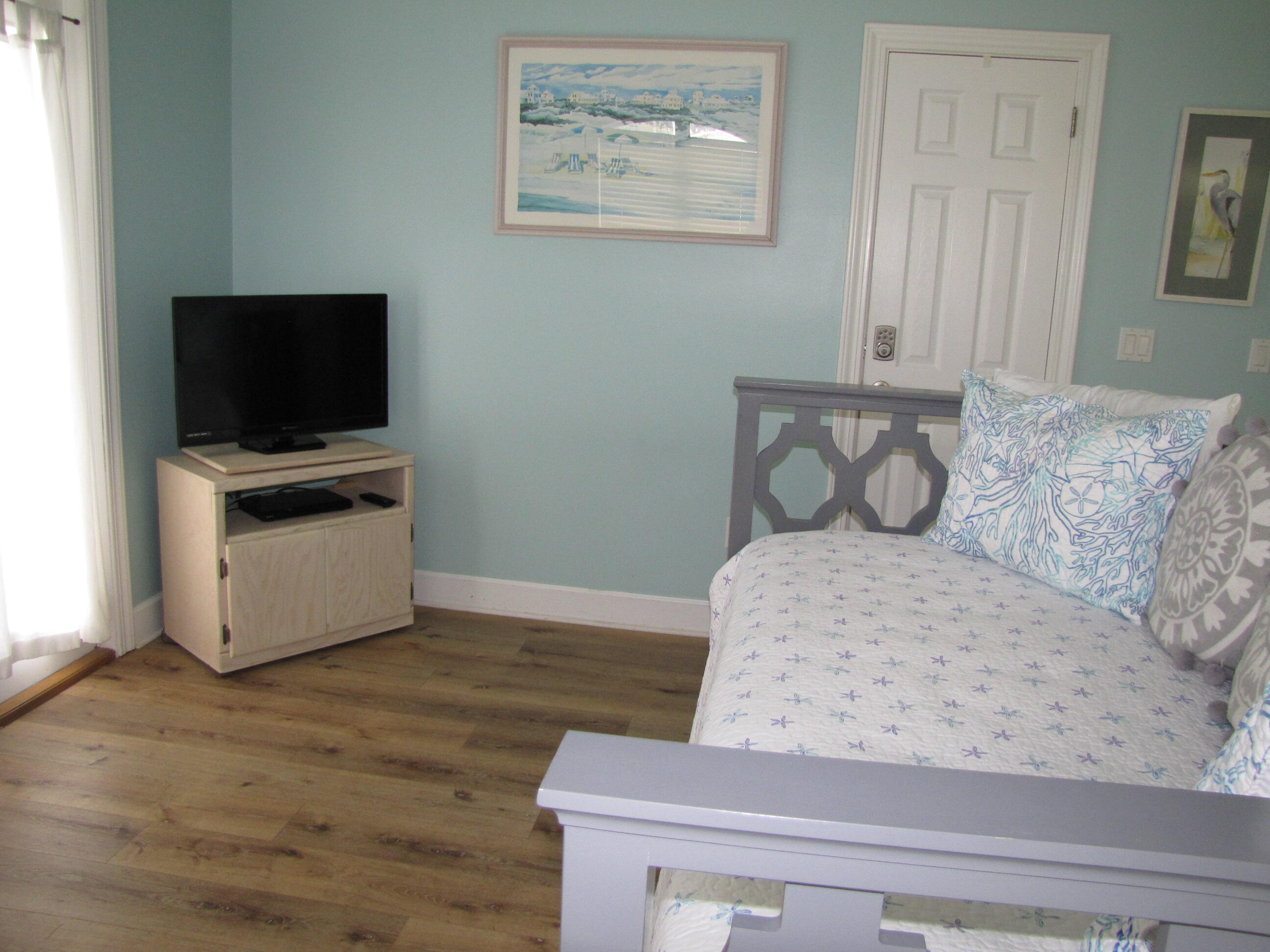22 Amber Cove Miramar Beach, FL 32550 - Photo 25 of 60 a living room with furniture and a flat screen tv