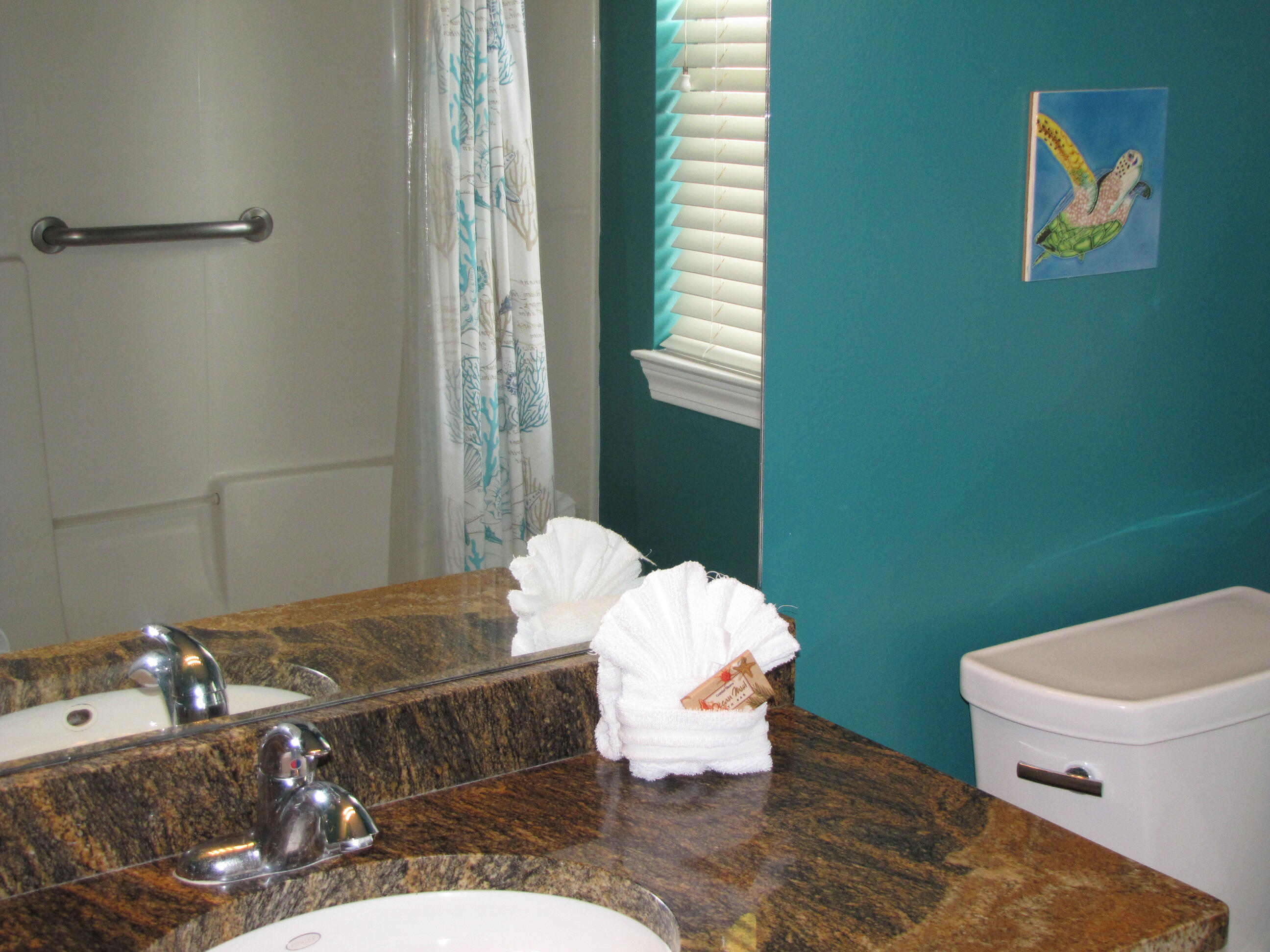 22 Amber Cove Miramar Beach, FL 32550 - Photo 34 of 60 a living room with furniture and a table