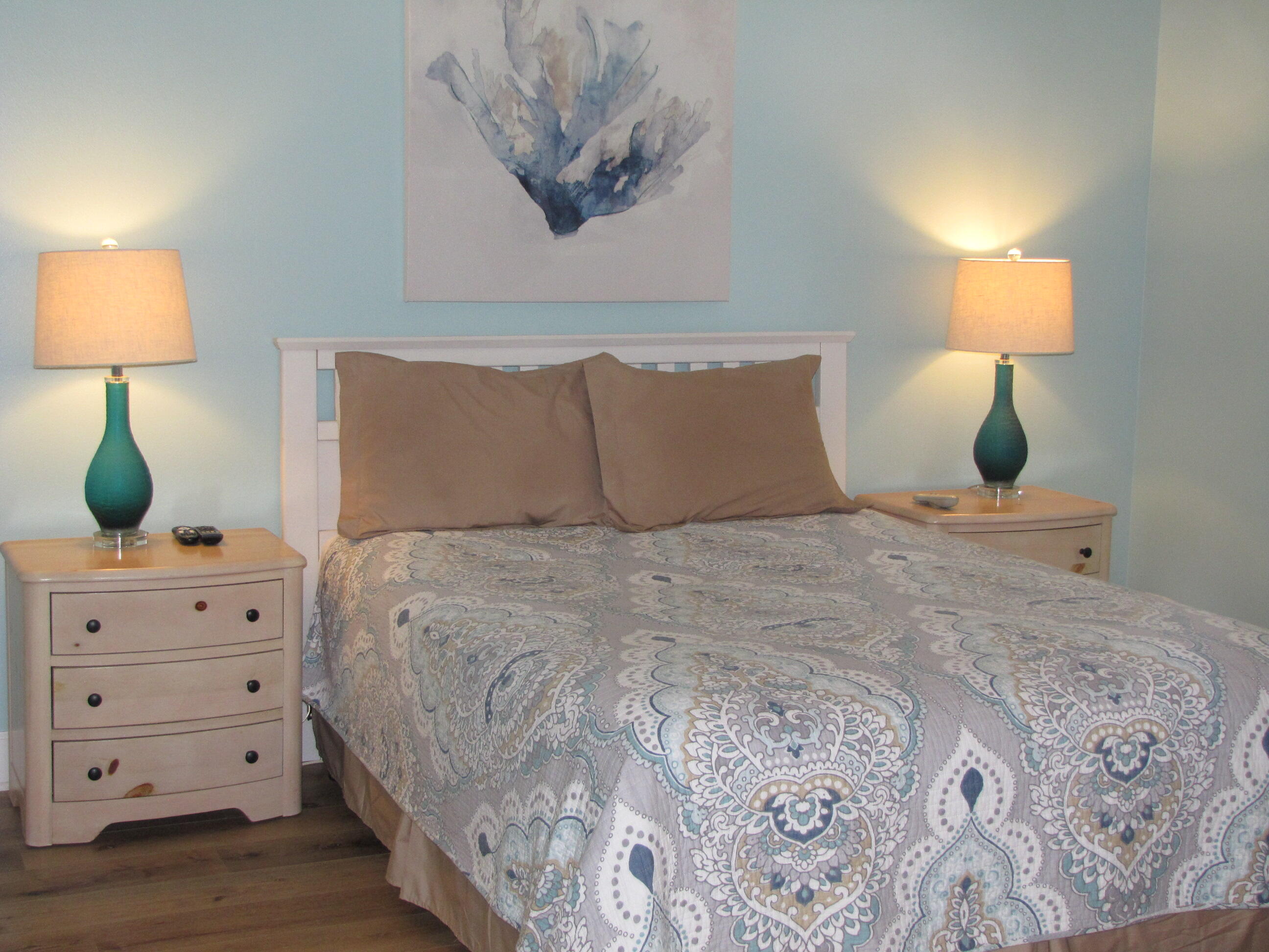 22 Amber Cove Miramar Beach, FL 32550 - Photo 35 of 60 a bedroom with a bed and a lamp on dresser