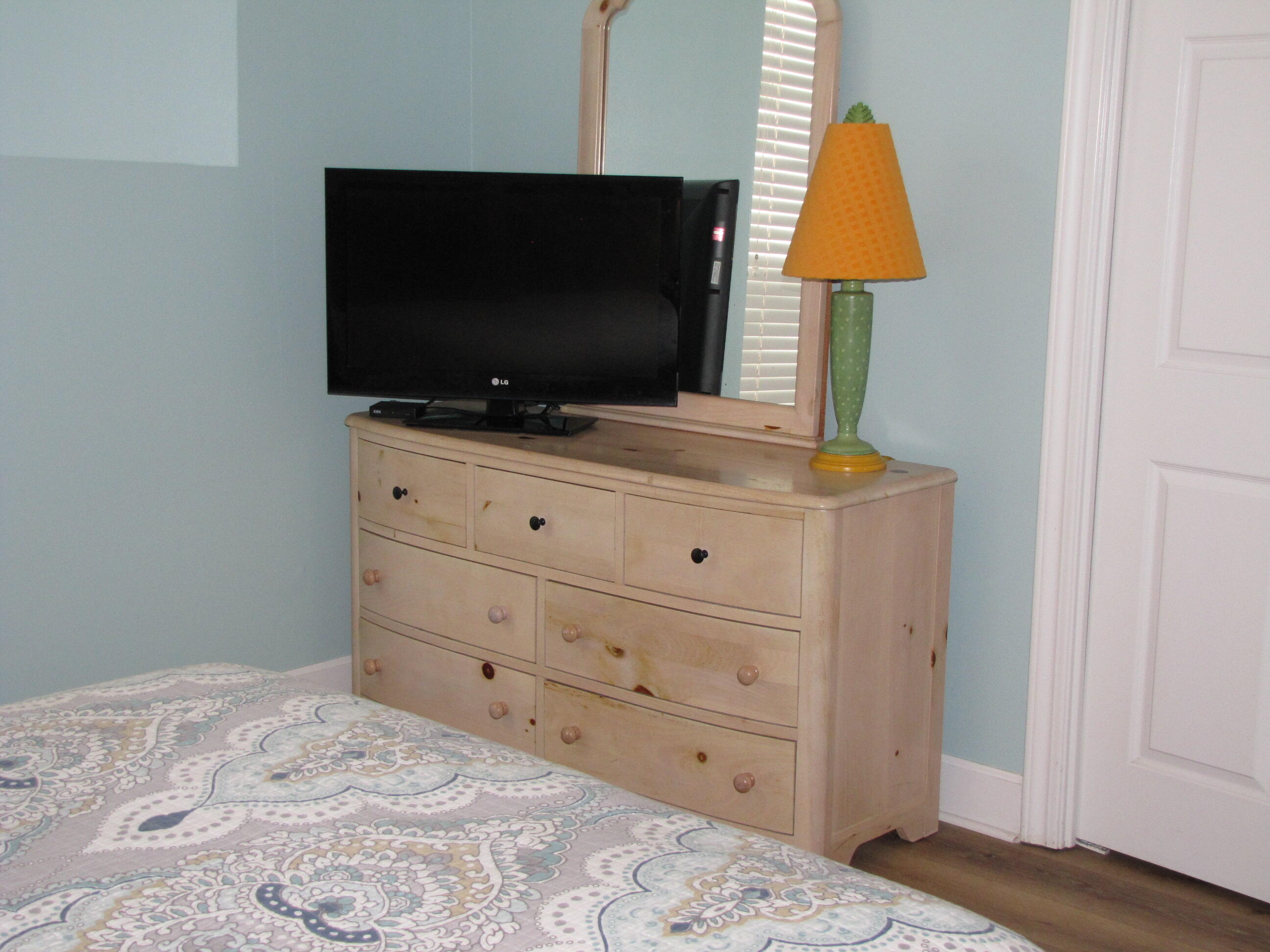 22 Amber Cove Miramar Beach, FL 32550 - Photo 36 of 60 a bedroom with a bed and a flat screen tv