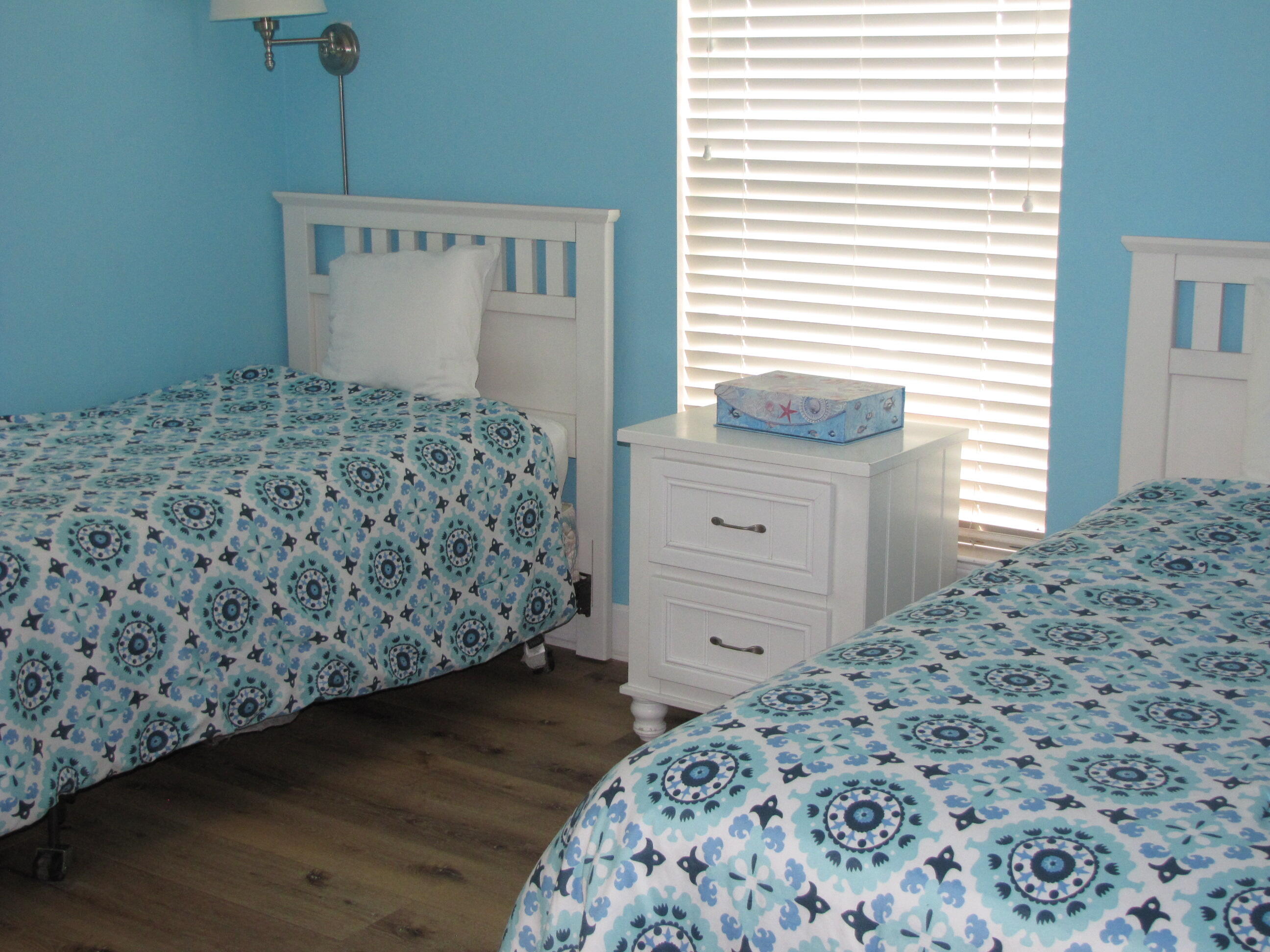 22 Amber Cove Miramar Beach, FL 32550 - Photo 37 of 60 a bedroom with a bed and a dresser