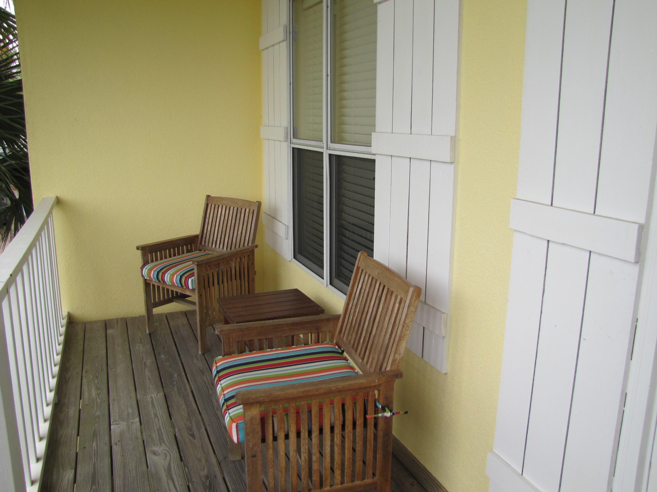 22 Amber Cove Miramar Beach, FL 32550 - Photo 41 of 60 a view of a balcony with wooden floor