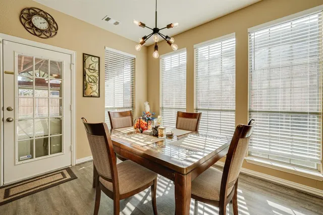 a view of a dining room with furniture window and outside view