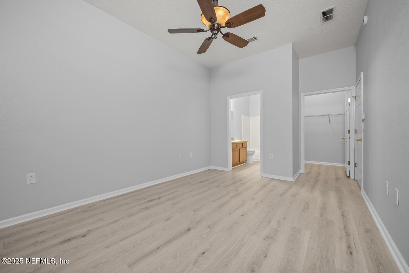 7920 Merrill Road West, Unit 1604 Jacksonville, FL 32277 - Photo 14 of 30 a view of an empty room and window