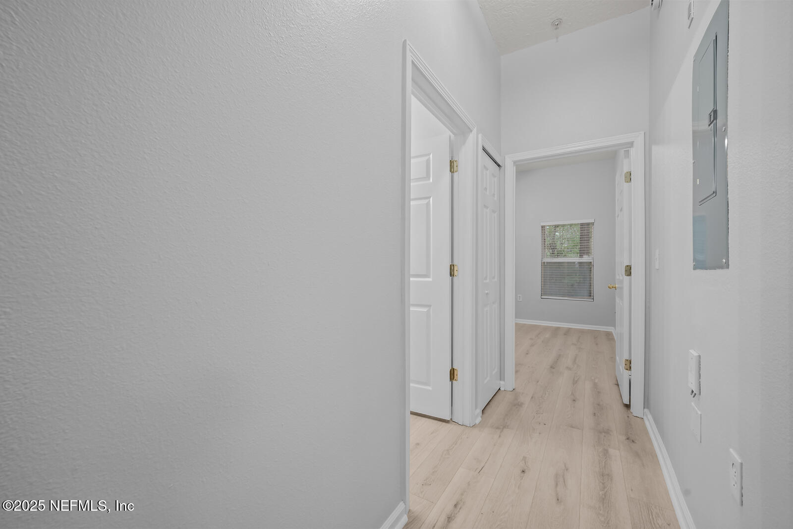 7920 Merrill Road West, Unit 1604 Jacksonville, FL 32277 - Photo 17 of 30 a view of a hallway with wooden floor