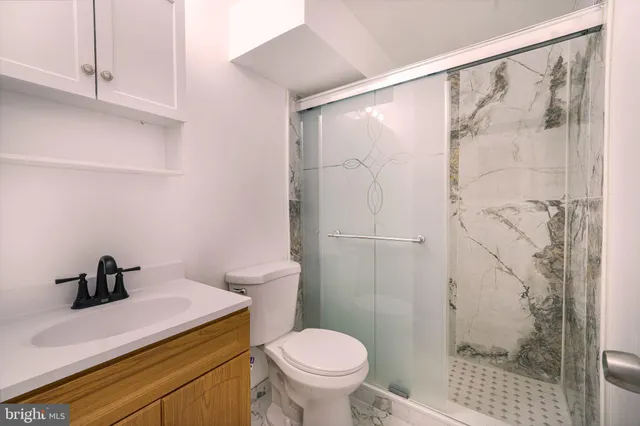 a bathroom with a sink and a toilet