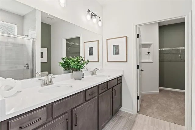 a view of a backyard with plants and patio