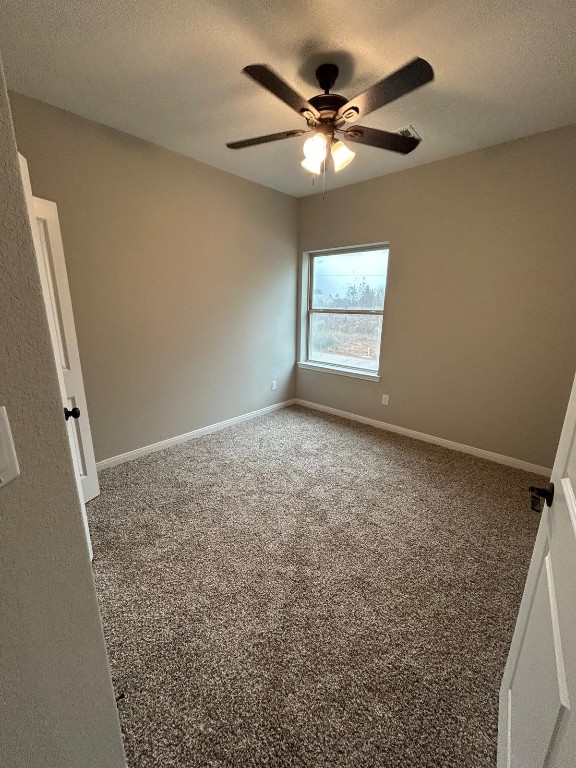 14010 Longstreet Road, Unit 17 Willis, TX 77318 - Photo 5 of 9 an empty room with a window