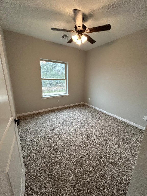 14010 Longstreet Road, Unit 17 Willis, TX 77318 - Photo 6 of 9 an empty room with a window