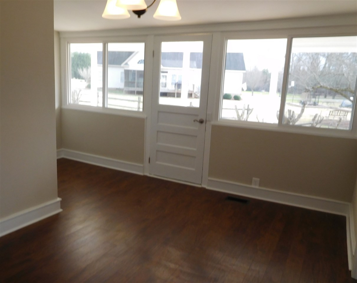 1770 Cooper Branch Road Clayton, NC 27520 - Photo 8 of 24 Welcome your guests into this spacious and light-filled dining room! Dining Room