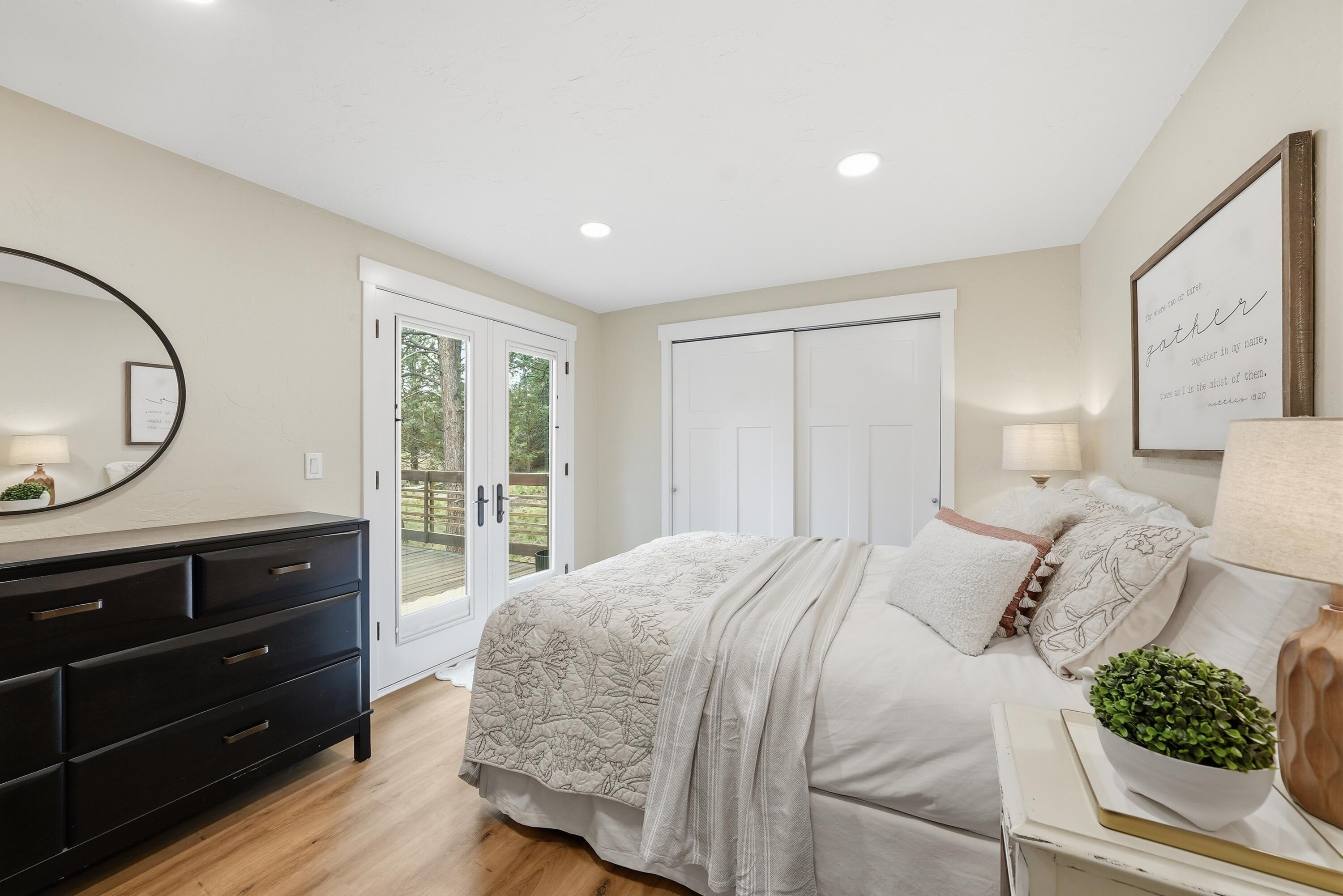 1961 Southwest Knoll Avenue Bend, OR 97702 - Photo 21 of 53 a bedroom with a bed and a dresser