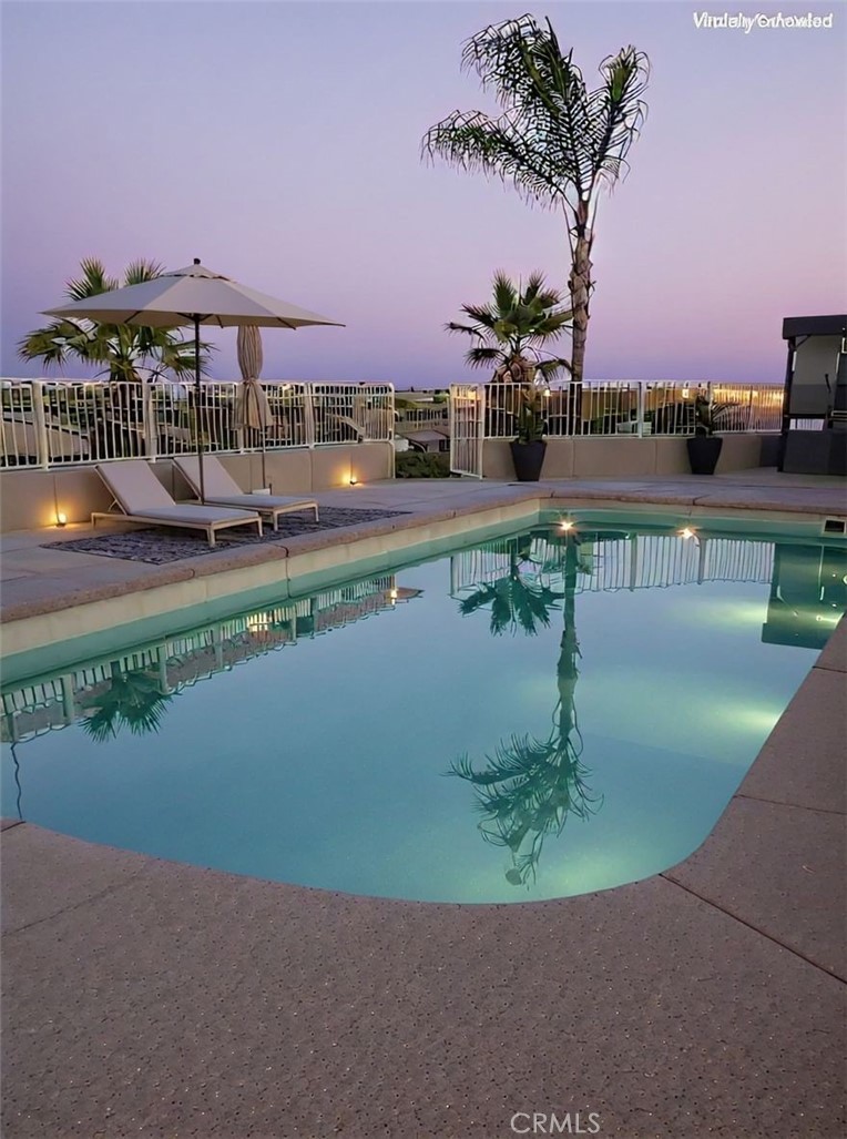 a view of a lake with a yard