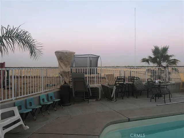 a view of a terrace with furniture