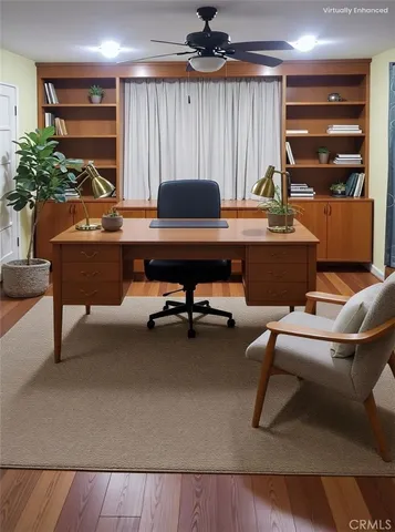 a room with furniture and a potted plant