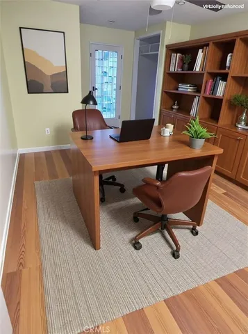 a view of a workspace with furniture