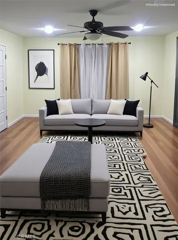 a living room with furniture and a rug