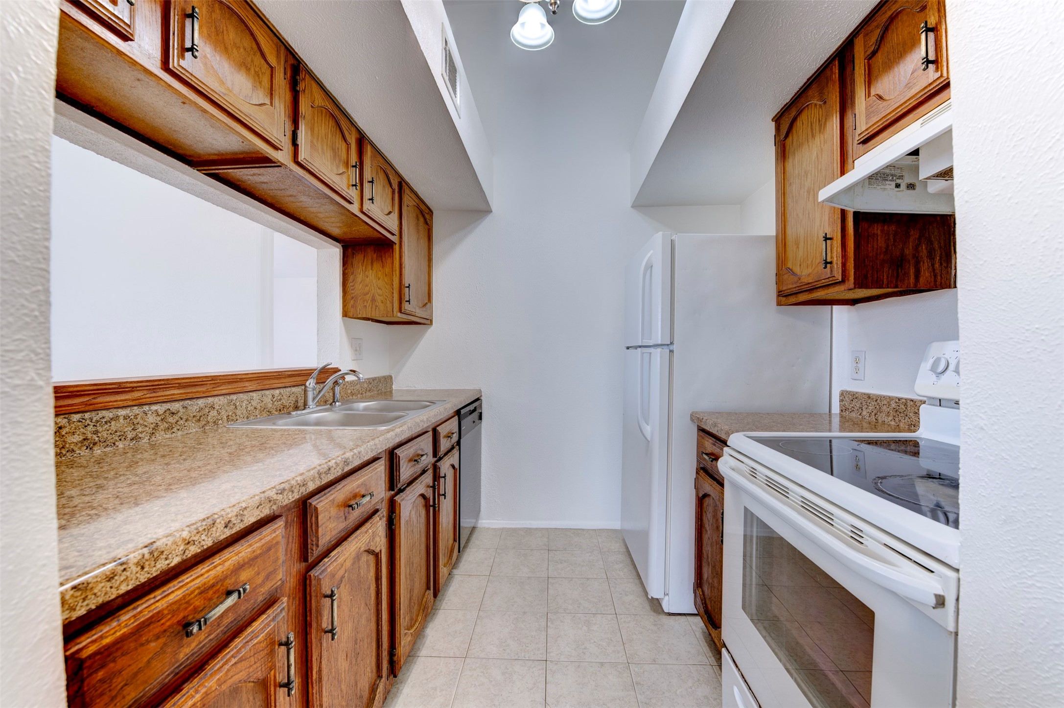 14323 Edenglen Drive Houston, TX 77049 - Photo 9 of 27 a bathroom with a sink and a mirror