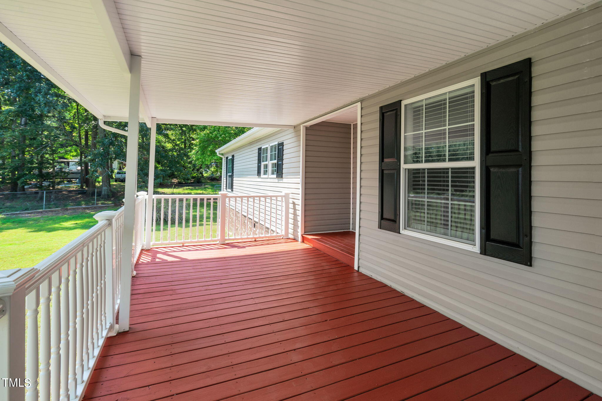 4711 Wheels Hill Road Durham, NC 27705 - Photo 7 of 67 Covered front porch/deck
