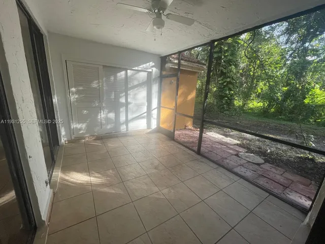 a room with a glass door