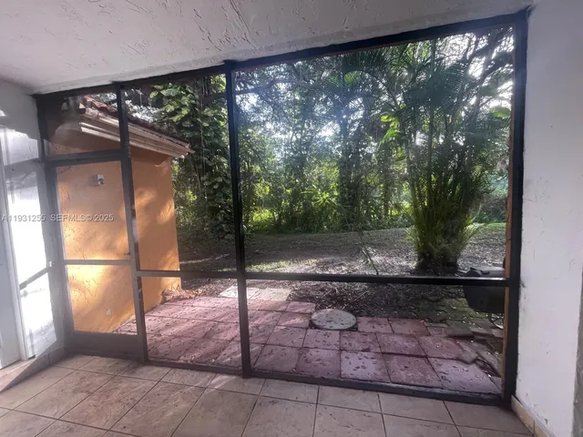 a view of a porch with a yard