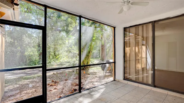 a view of a room with a large window