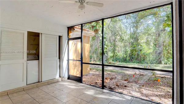 a view of a room with a large window
