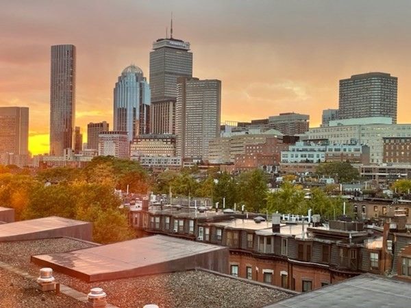 a view of city with tall buildings