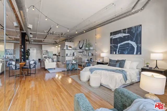 a living room with furniture and a view of the