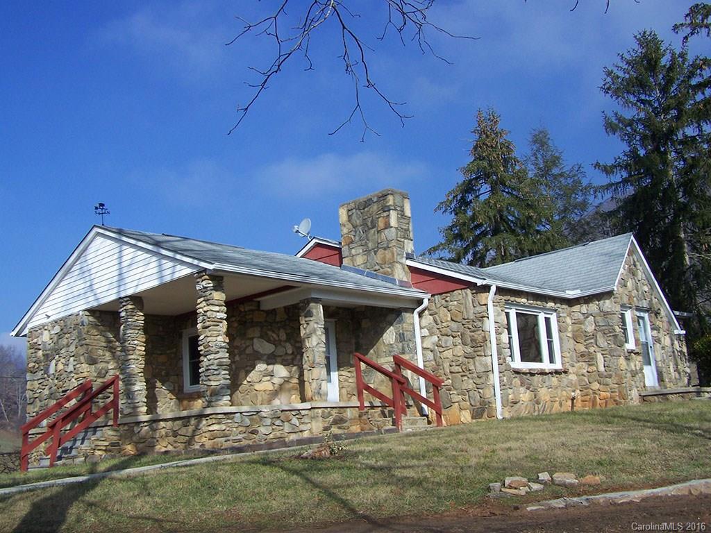 430 Carswell Road, Unit 1 Clyde, NC 28721 - Photo 1 of 23 a front view of a house with garden