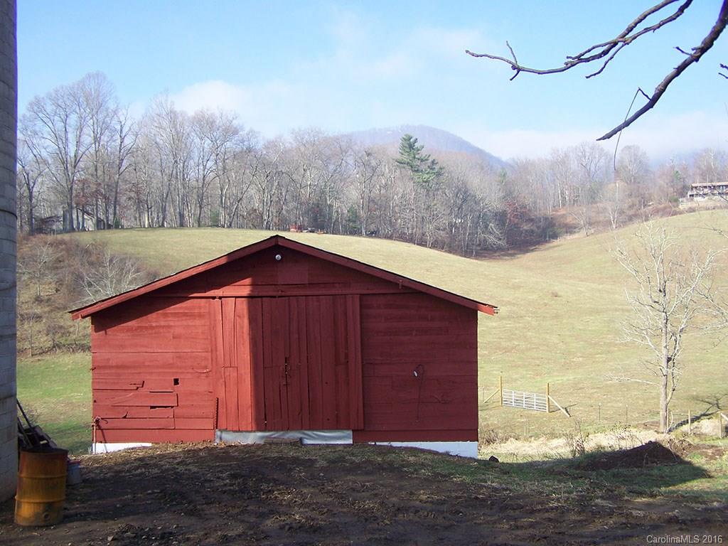 430 Carswell Road, Unit 1 Clyde, NC 28721 - Photo 3 of 23 a view of a backyard of the house