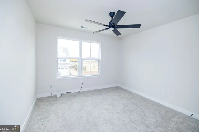 a view of a garden with a lake