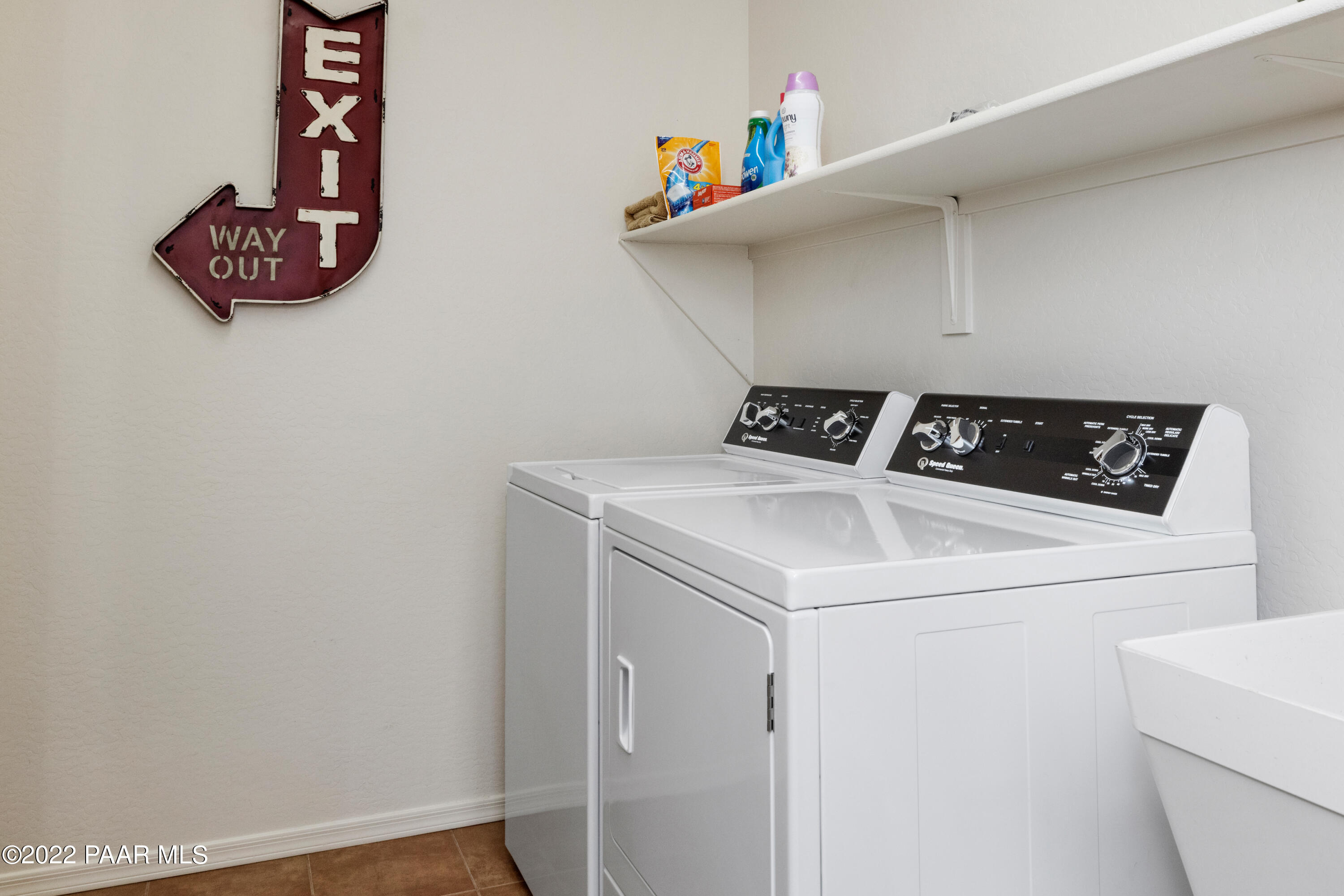7226 Woolsey Ranch Road Prescott Valley, AZ 86314 - Photo 20 of 30 a utility room with dryer and washer