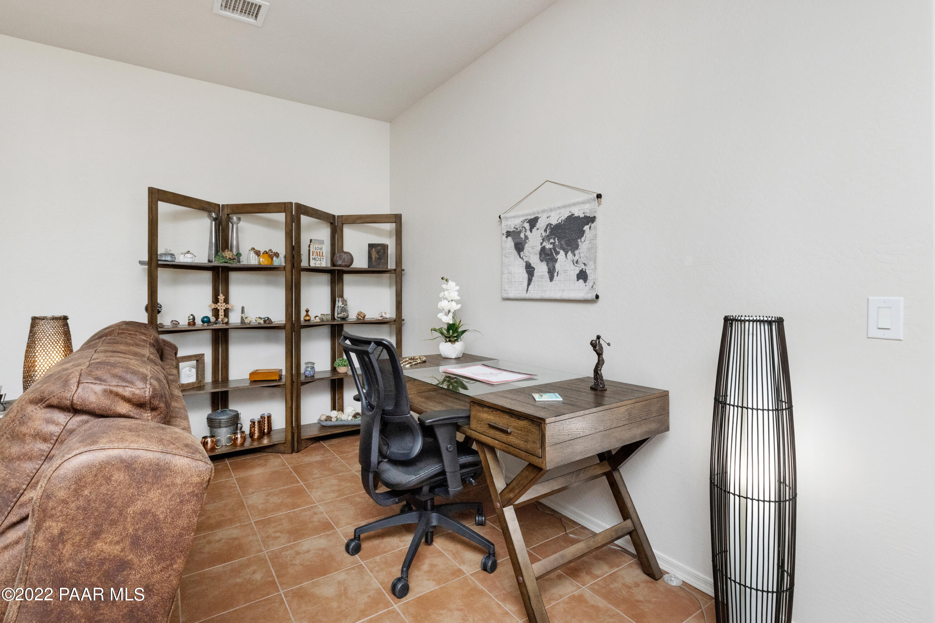 7226 Woolsey Ranch Road Prescott Valley, AZ 86314 - Photo 7 of 30 a view of a workspace with furniture