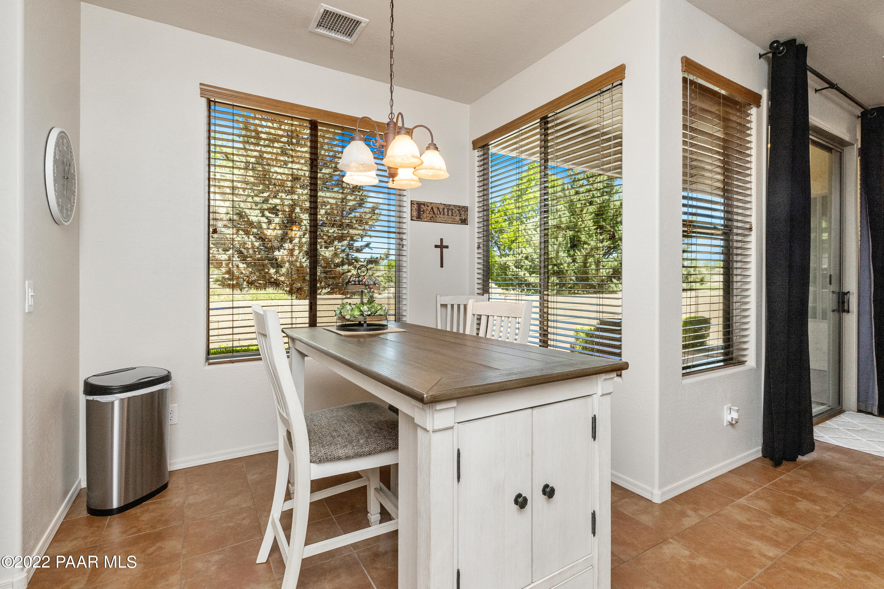 7226 Woolsey Ranch Road Prescott Valley, AZ 86314 - Photo 10 of 30 a kitchen with a table and chairs