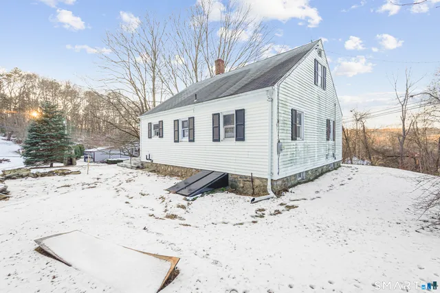 a view of a yard covered in snow
