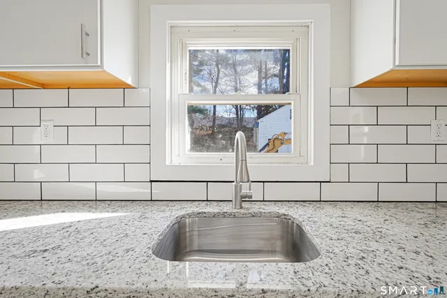 a bathroom with a sink and a bathtub