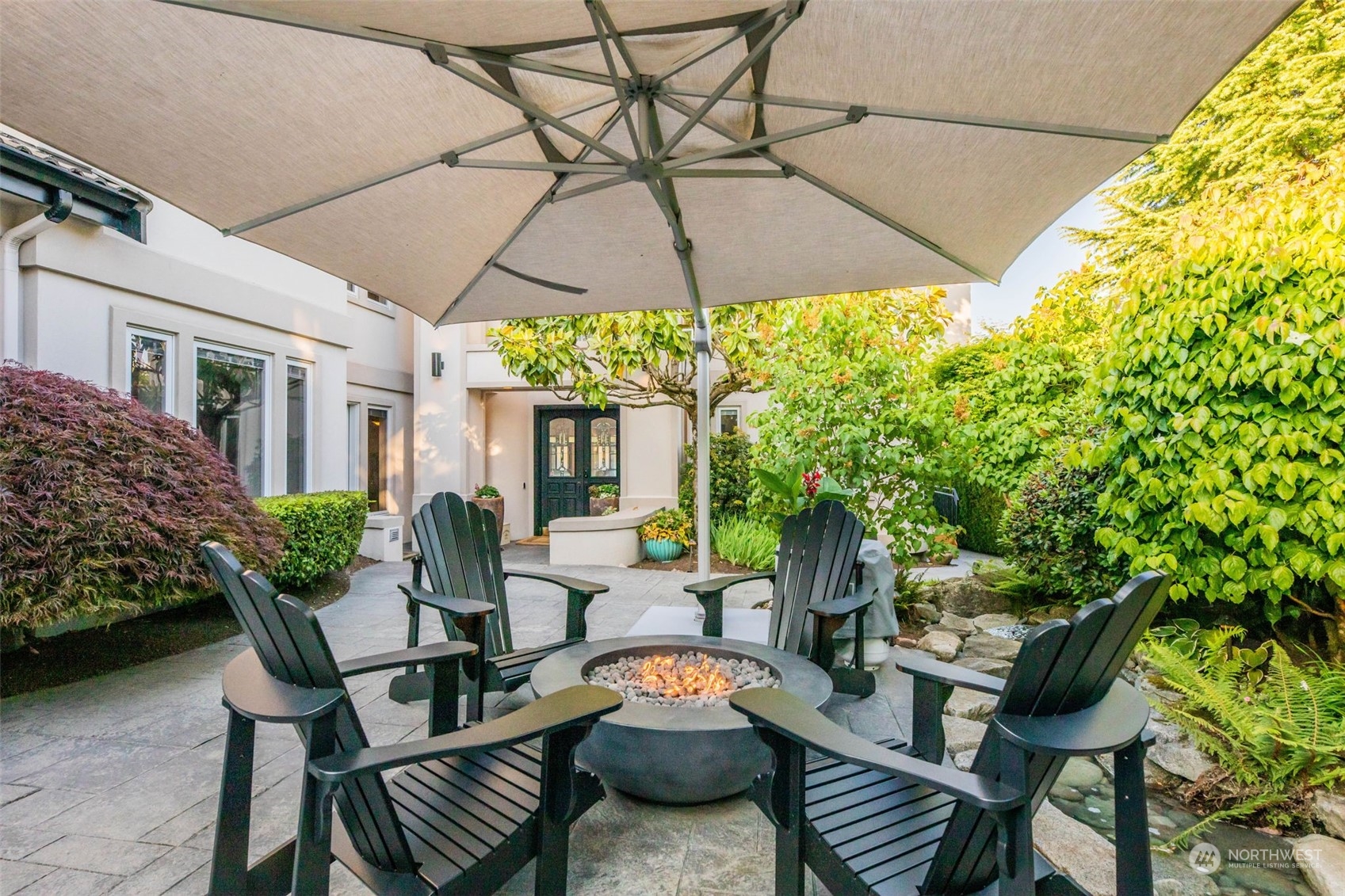 809 Stitch Road Lake Stevens, WA 98258 - Photo 12 of 40 a outdoor space with furniture and umbrella