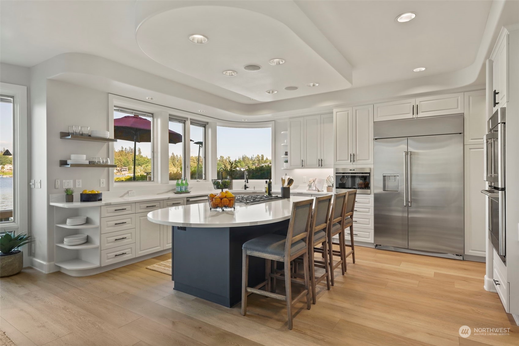 809 Stitch Road Lake Stevens, WA 98258 - Photo 17 of 40 a kitchen with stainless steel appliances kitchen island granite countertop a sink and cabinets