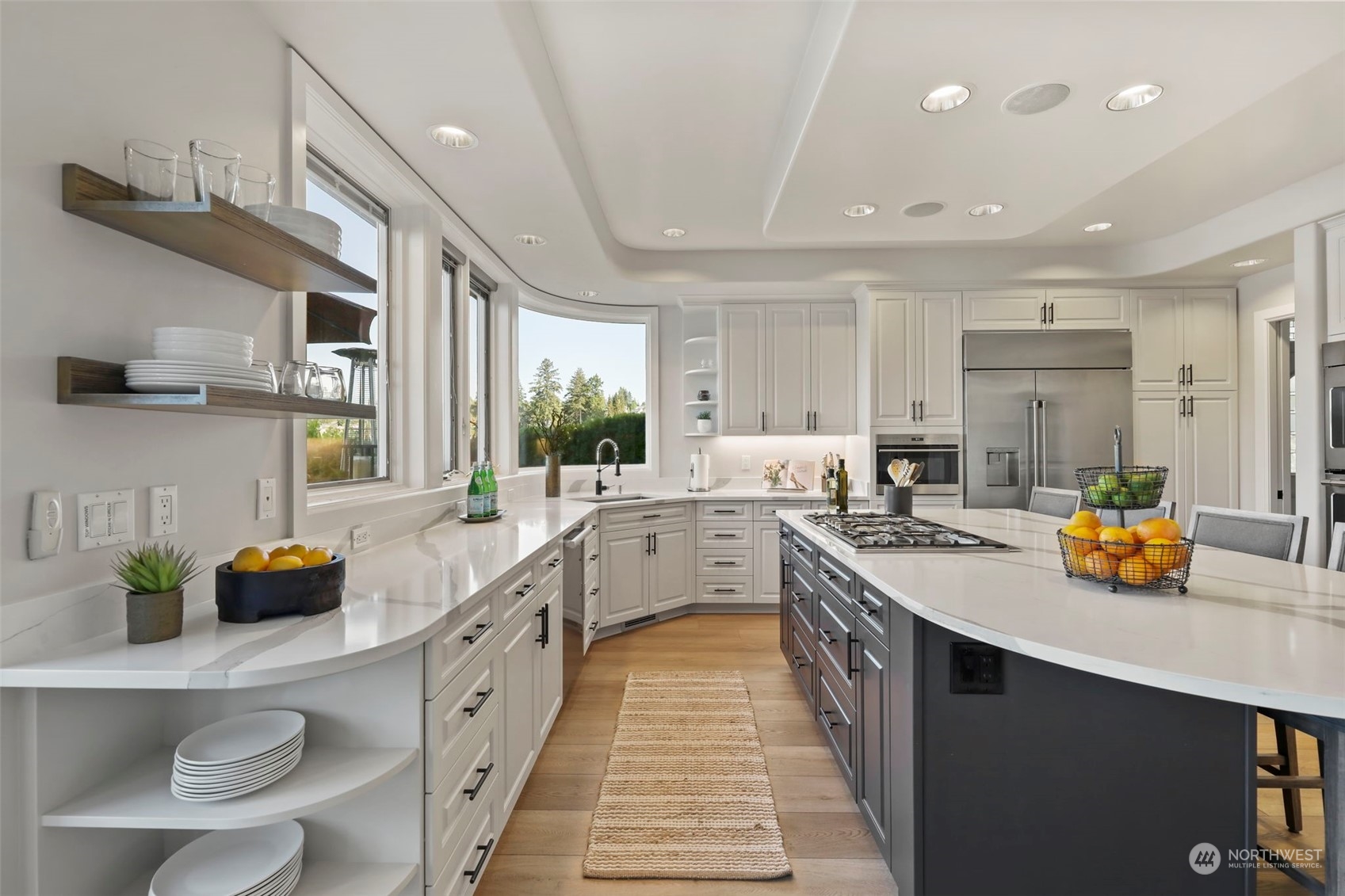 809 Stitch Road Lake Stevens, WA 98258 - Photo 18 of 40 a large white kitchen with lots of counter space and a sink