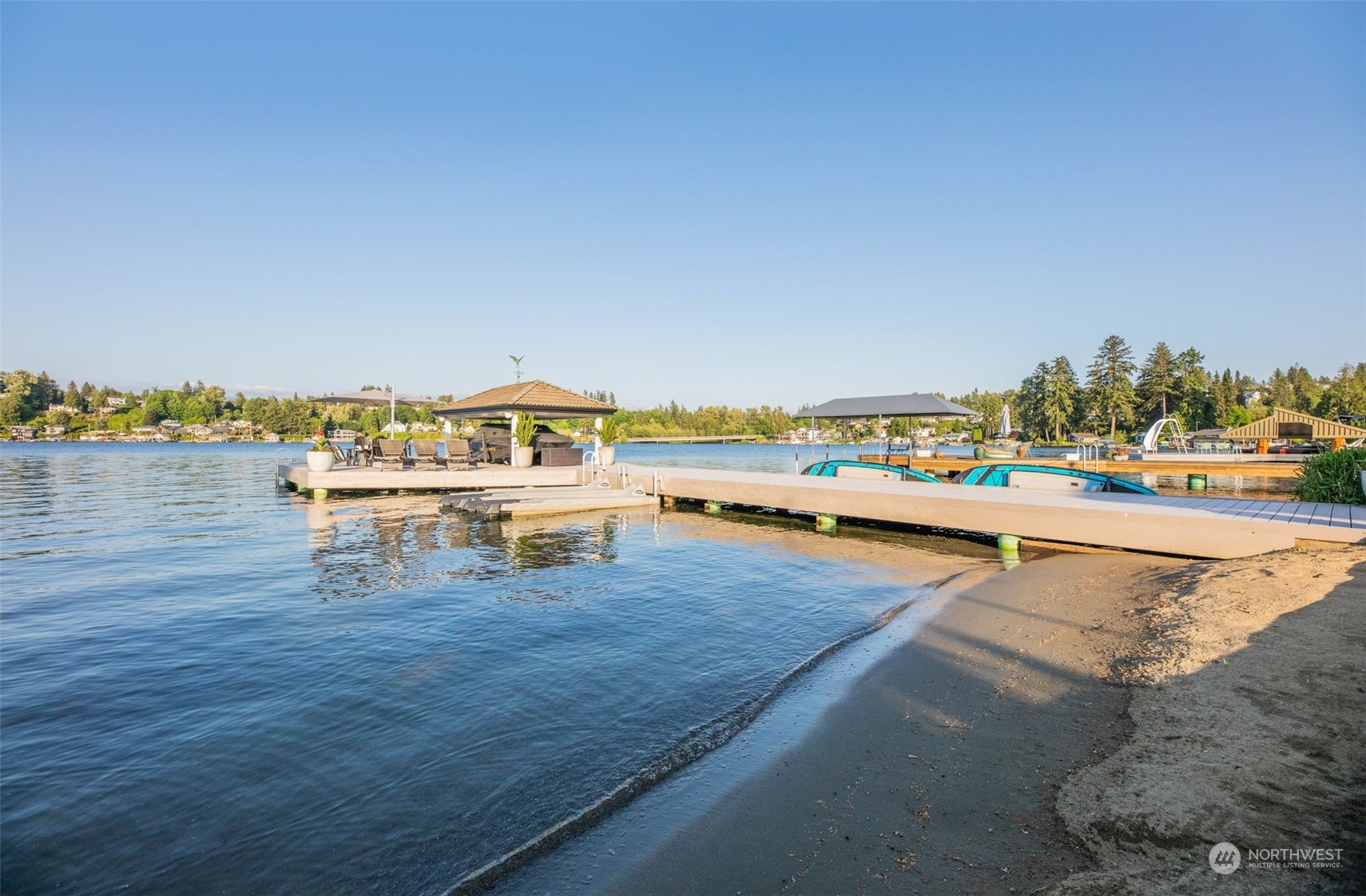 809 Stitch Road Lake Stevens, WA 98258 - Photo 2 of 40 a view of ocean with boats and trees in the background