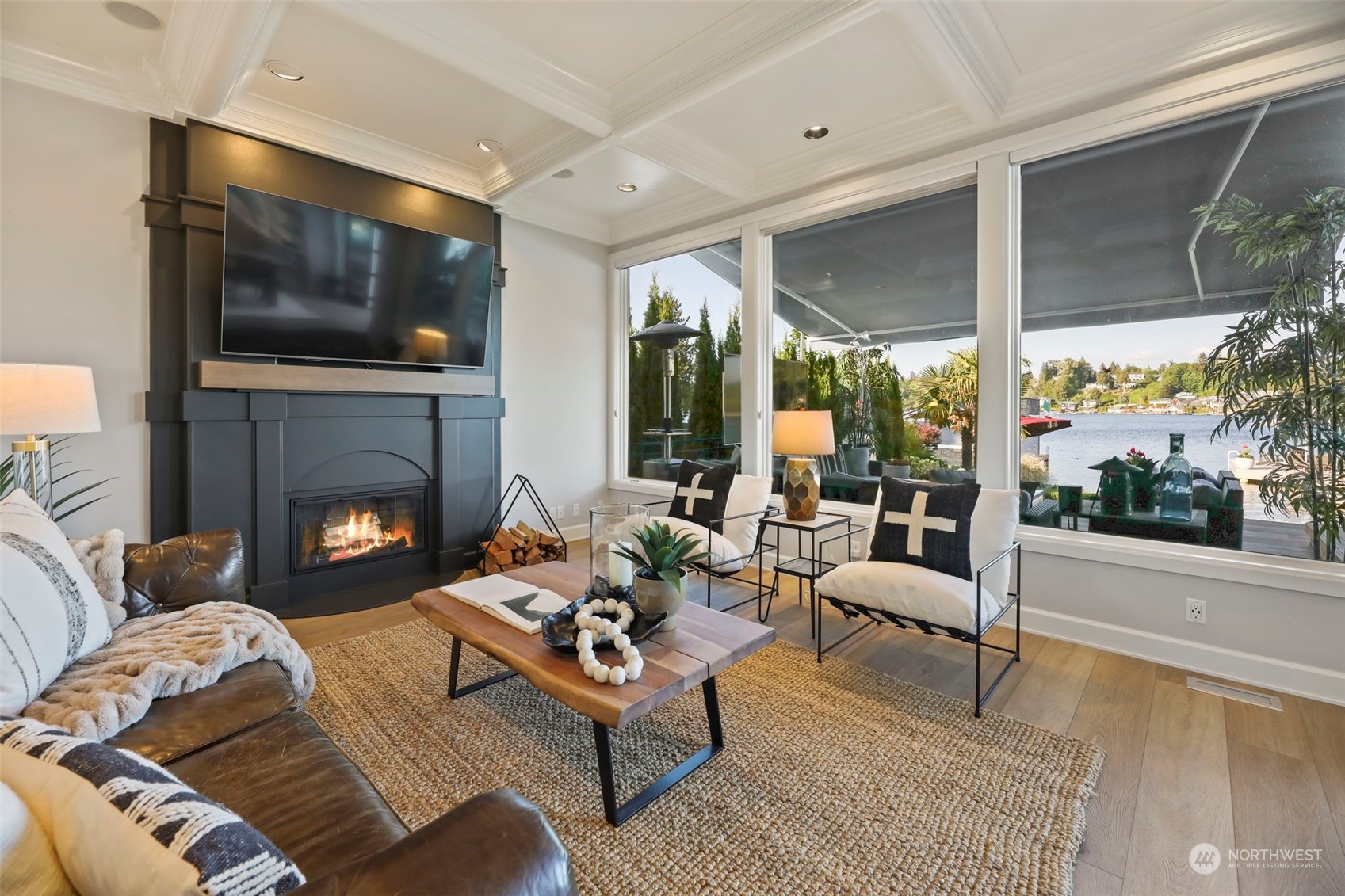 809 Stitch Road Lake Stevens, WA 98258 - Photo 21 of 40 a living room with furniture fireplace and a flat screen tv