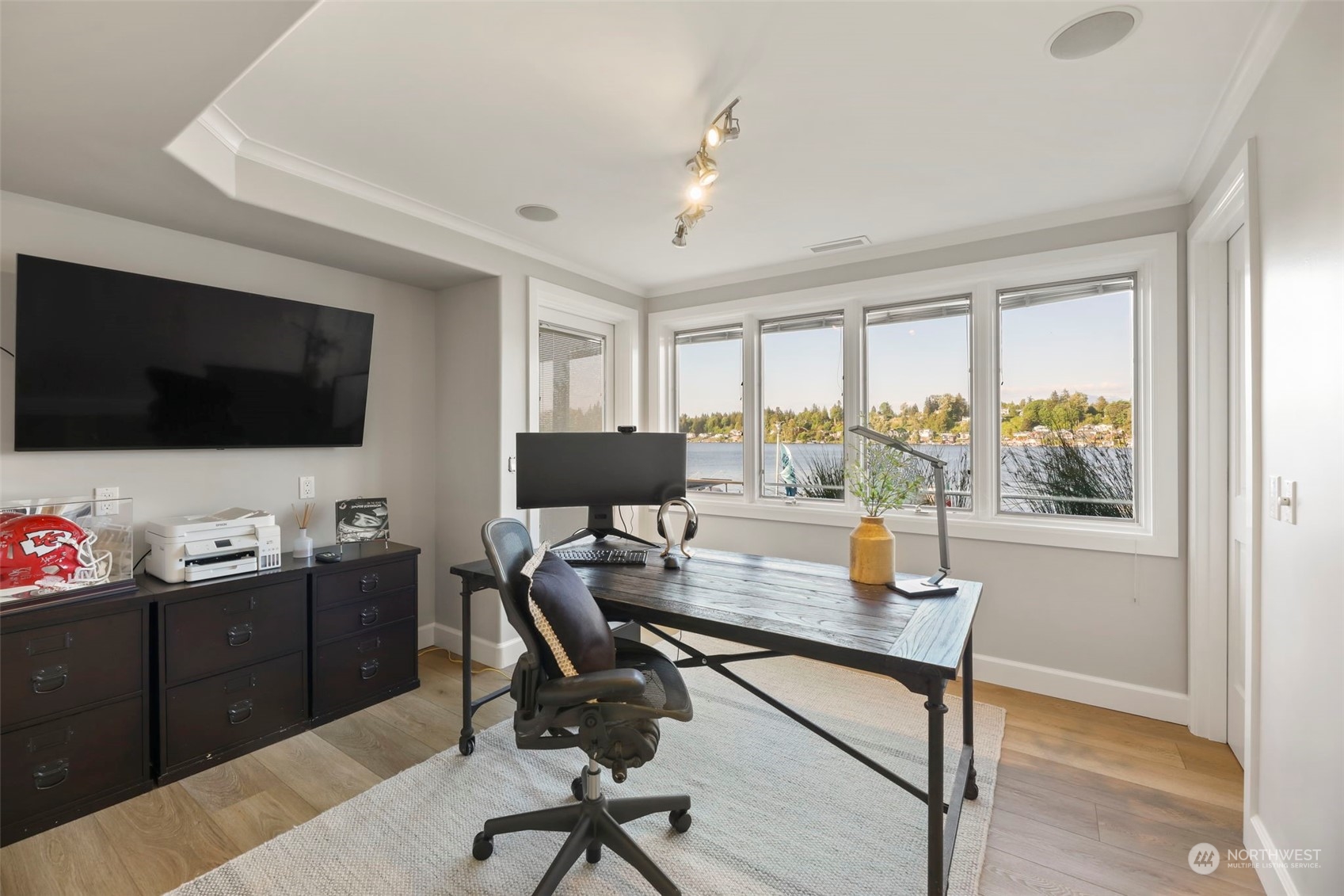 809 Stitch Road Lake Stevens, WA 98258 - Photo 32 of 40 a view of a workspace with furniture and a flat screen tv
