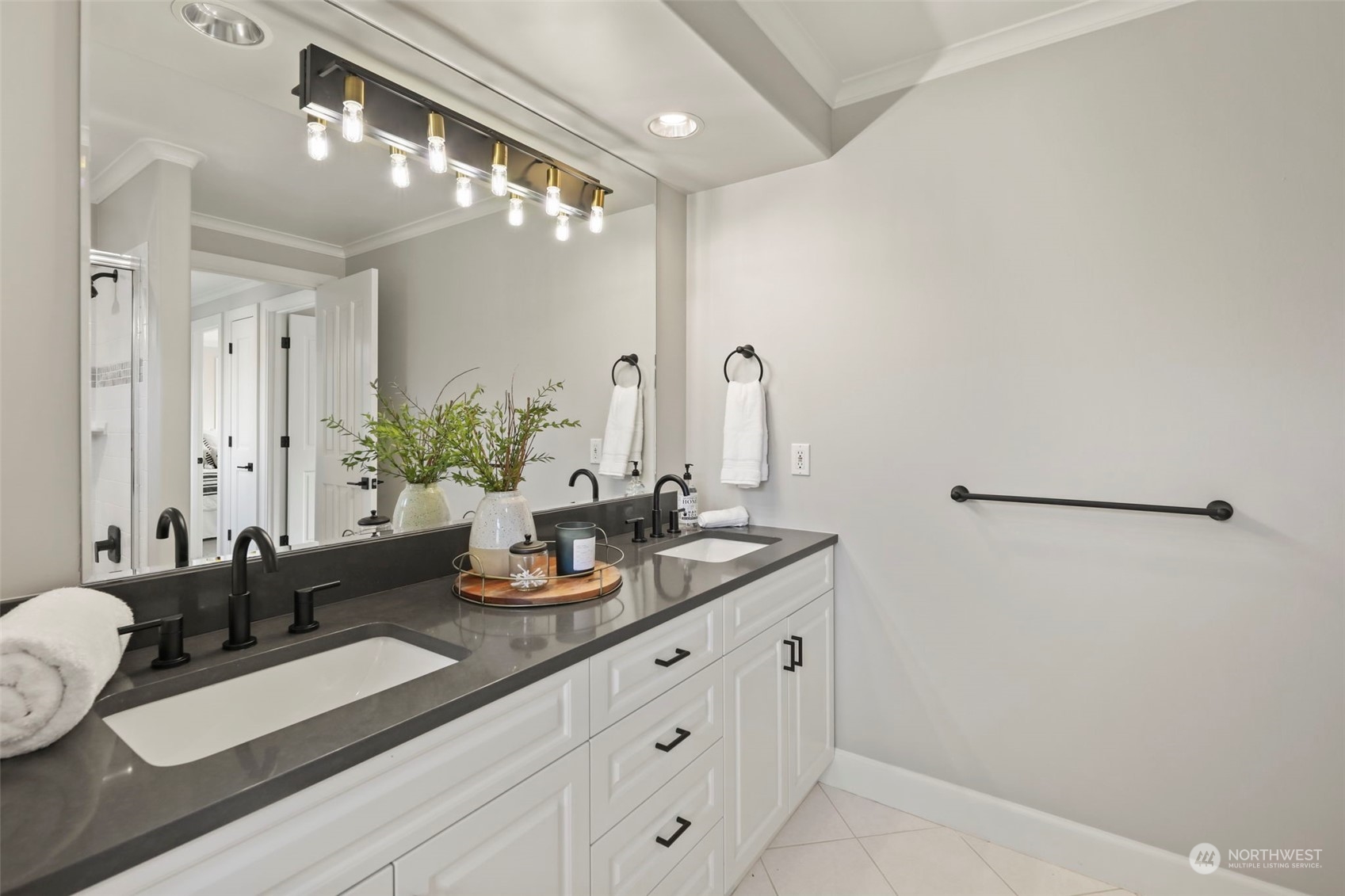809 Stitch Road Lake Stevens, WA 98258 - Photo 35 of 40 a bathroom with a granite countertop sink a mirror and a shower
